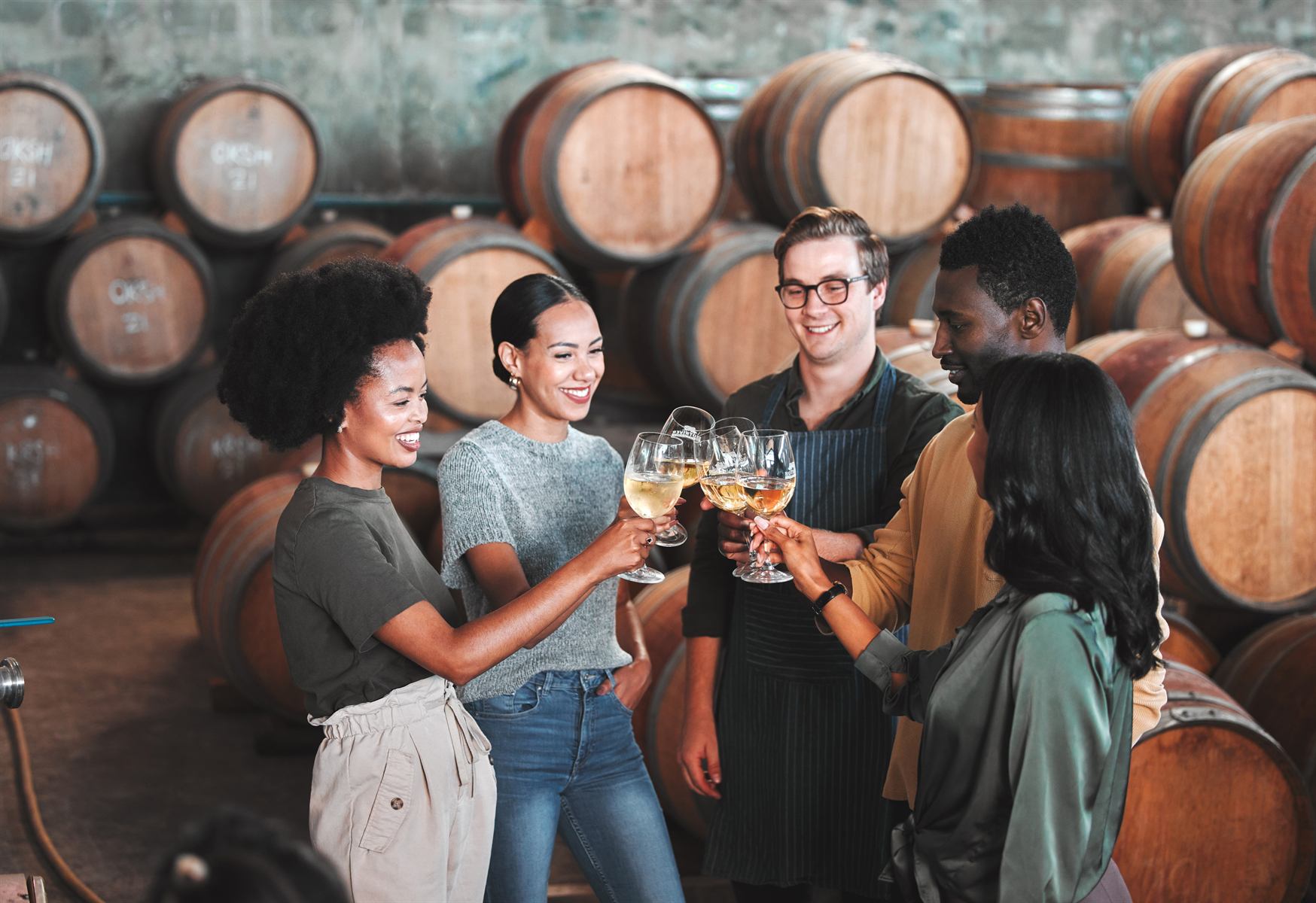 Kelowna wine tasting flight with white, rosé, and red wines overlooking vineyards